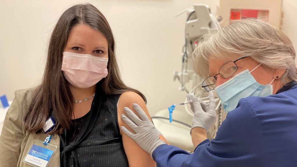 Mayo Clinic Health System Cannon Falls employee Leah Lindbeck, D.N.P. receiving her COVID-19 vaccine