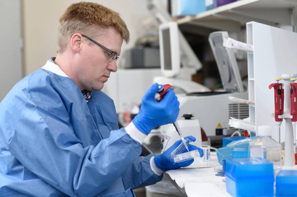 Mayo Clinic researcher Timothy Nelson, M.D., Ph.D., working in his lab