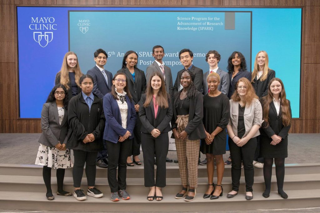 Students gather for a photo during the 5th annual SPARK awards ceremony and poster symposium (2022)