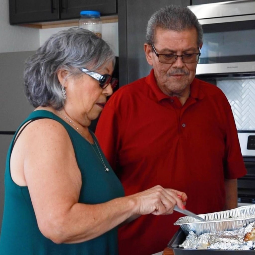 man and woman cooking.Patient had liver disease.