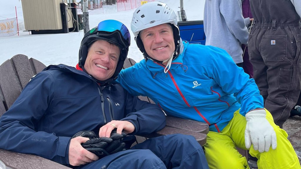 Successful epilepsy treatment allowed Eric Walthall, left, to resume skiing, a pastime he and friend Craig Wanous had enjoyed previously.
