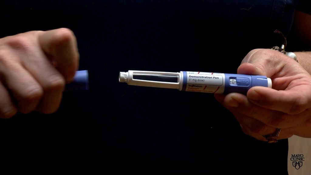 A closeup shot of a Wegovy semaglutide weight-loss drug injection demonstration pen.