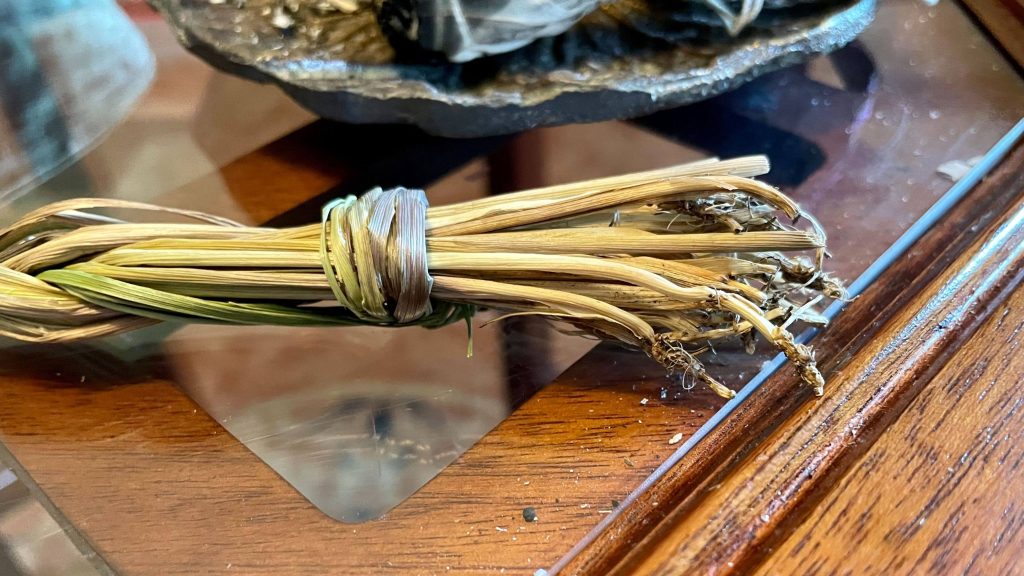 Bundle of braided sweetgrass used in smudging ceremonies.