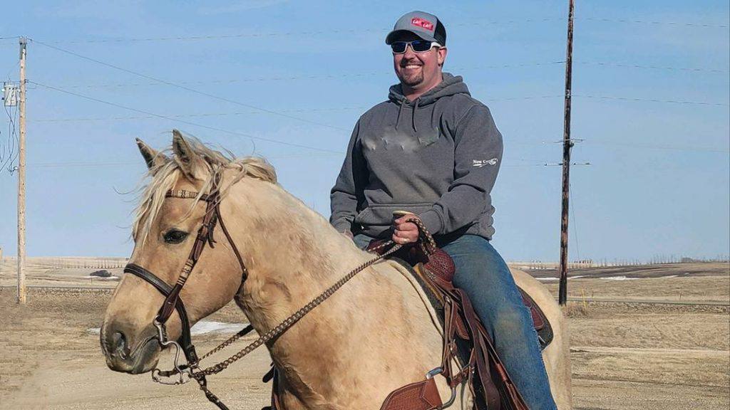 Andy Grundstad on horseback