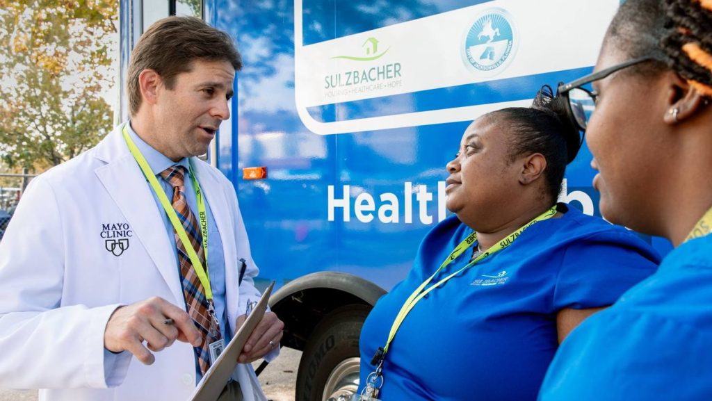 Medical staff prepare to see patients in mobile clinic