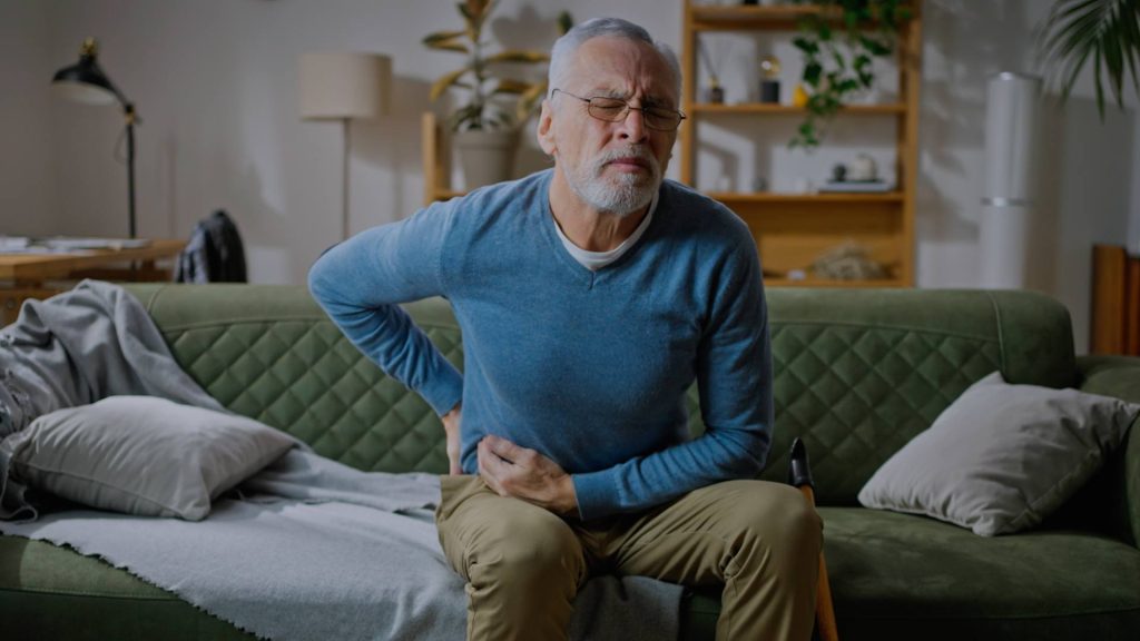 Man experiencing gallstone pain