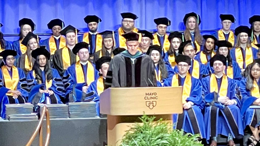Dr. Bryce Binstadt, MN Commencement 24, addresses new doctors and scientists