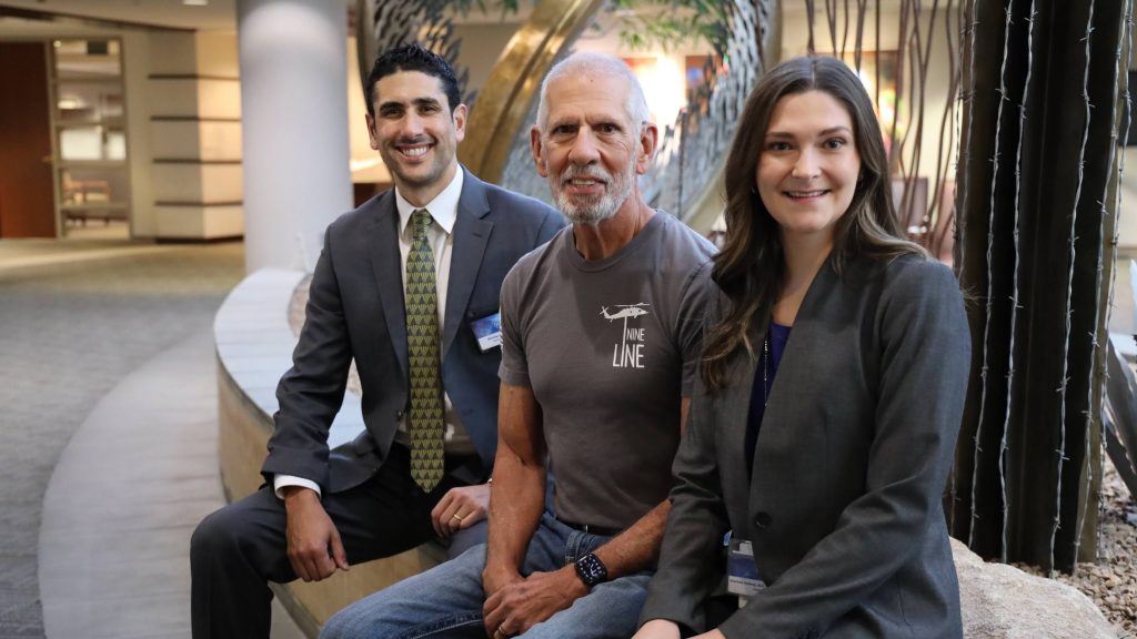 Dr. Nicholas Deep, patient Thomas Campbell, Dr. Courtney Kolberg, who collaborated to help Thomas with his hearing