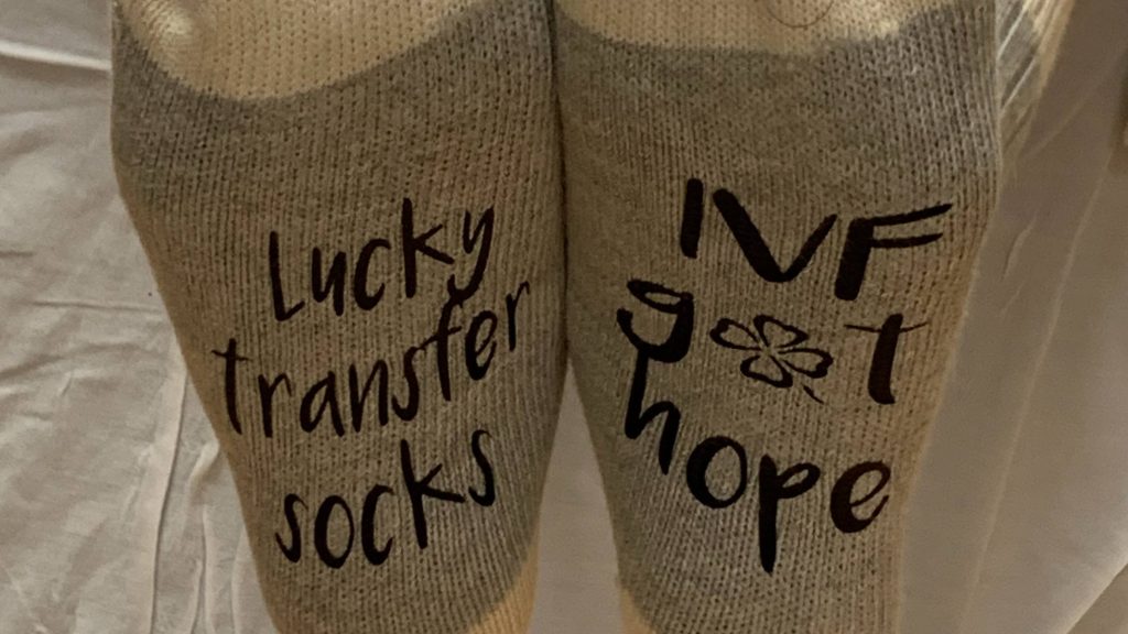 Erin Barreto shared her infertility journey with Mayo Clinic. She wore wollen socks of hope.
