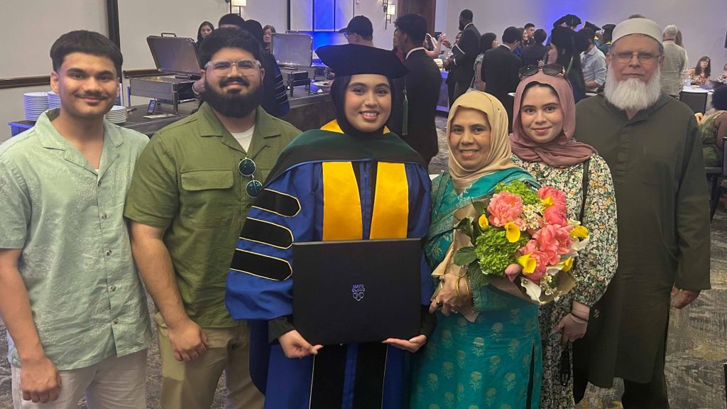 Dr. Isra Abdulwadood and her family