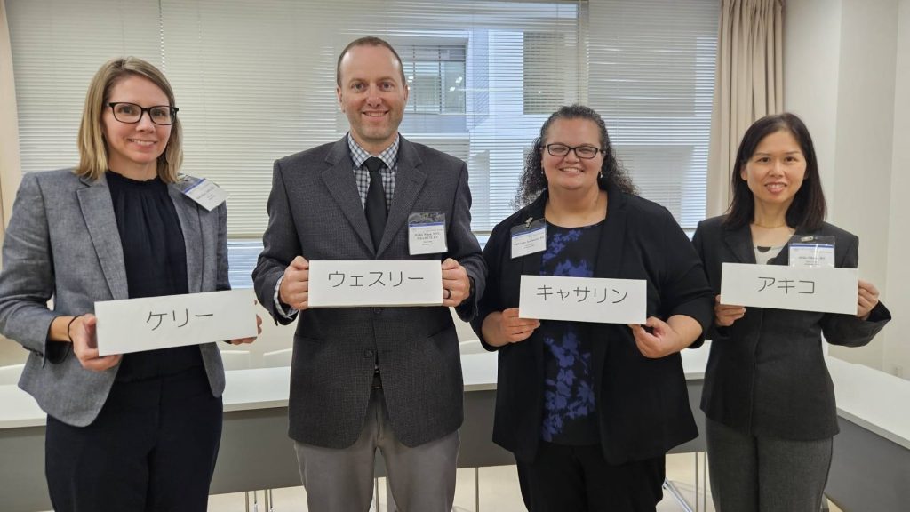 Japan Nursing Exchange Program participants display their name cards, written in Japanese. Left to right: Kelly Kiker, Wesley Nigon, Katie Kielkucki and Akiko Okano.