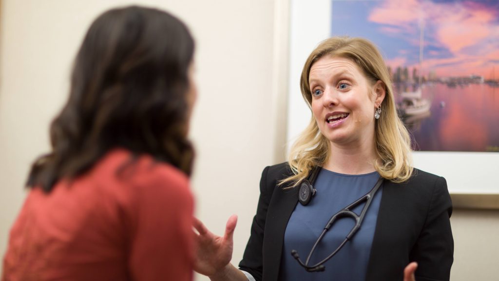 Dr. Allison Rosenthal talking with patient