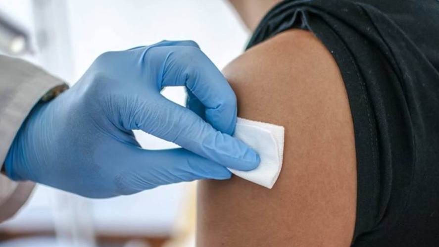 Person getting a vaccine, COVID-19 vaccine
