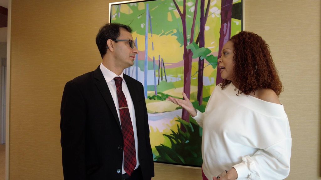 Dr. Tagathat Narula meets with Barbara Brown in Oct. 2025, eight and a half years after her transplant.