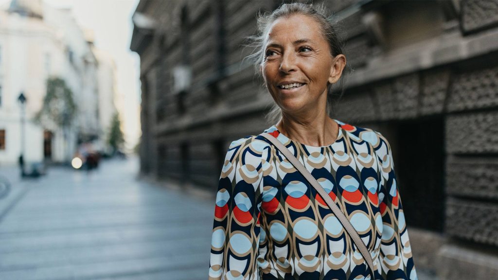 Photo of woman in city area.