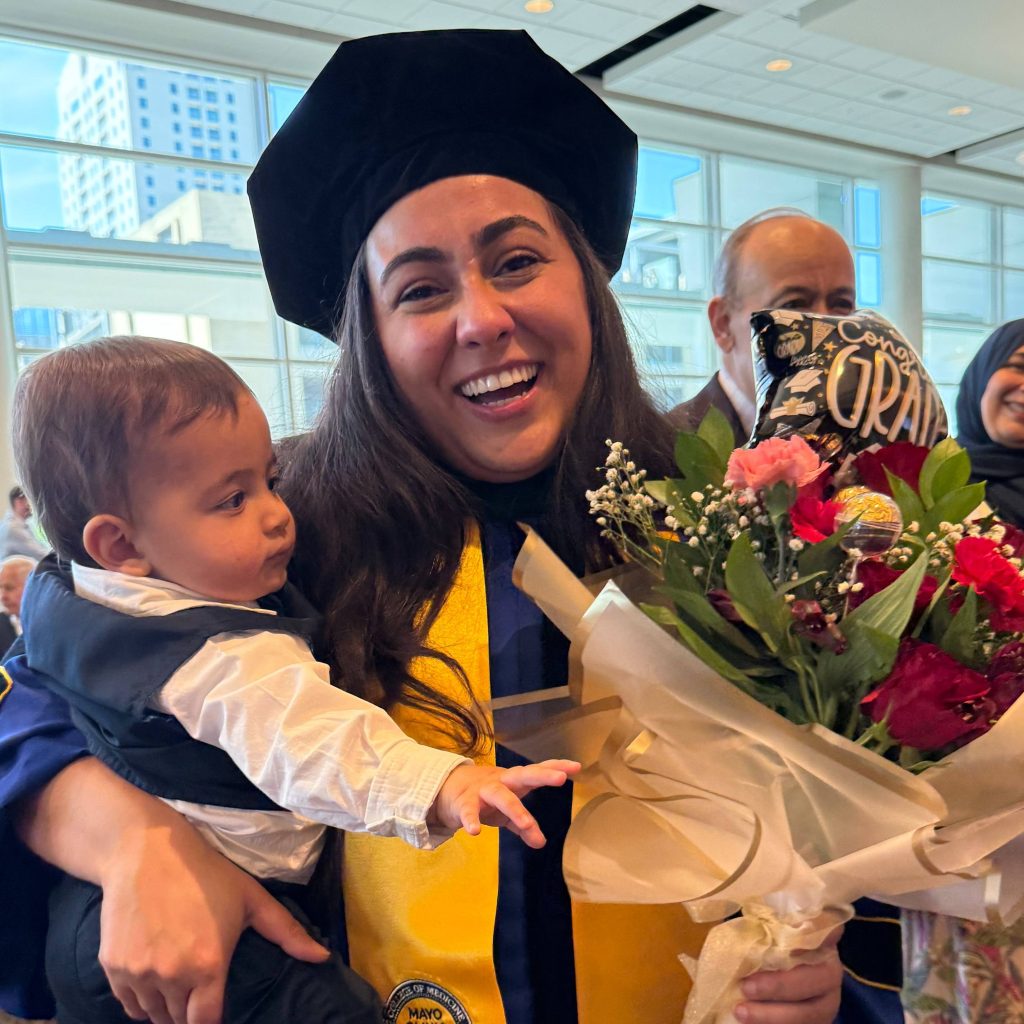 Class of 2026 Mayo Clinic Alix School of Medicine, MN, woman holding child