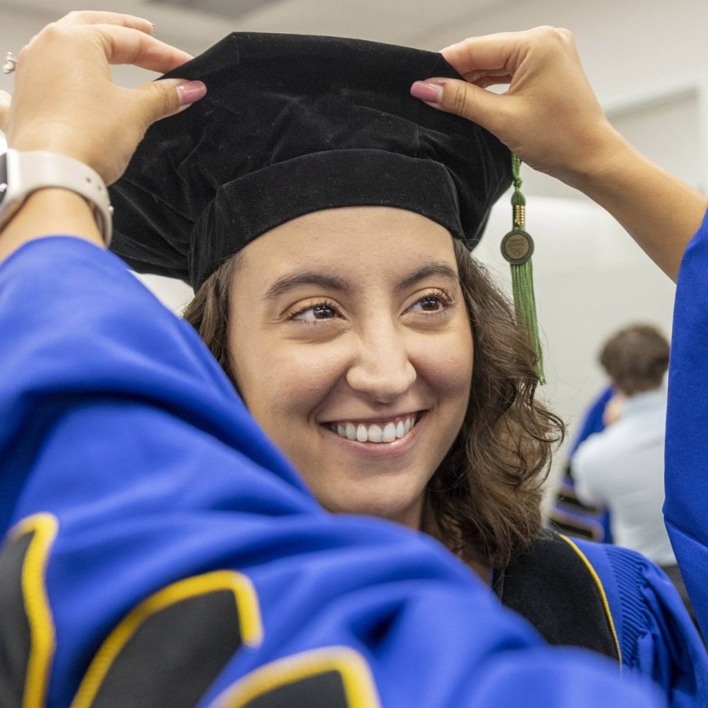 Young woman, Commencement 2026 FL