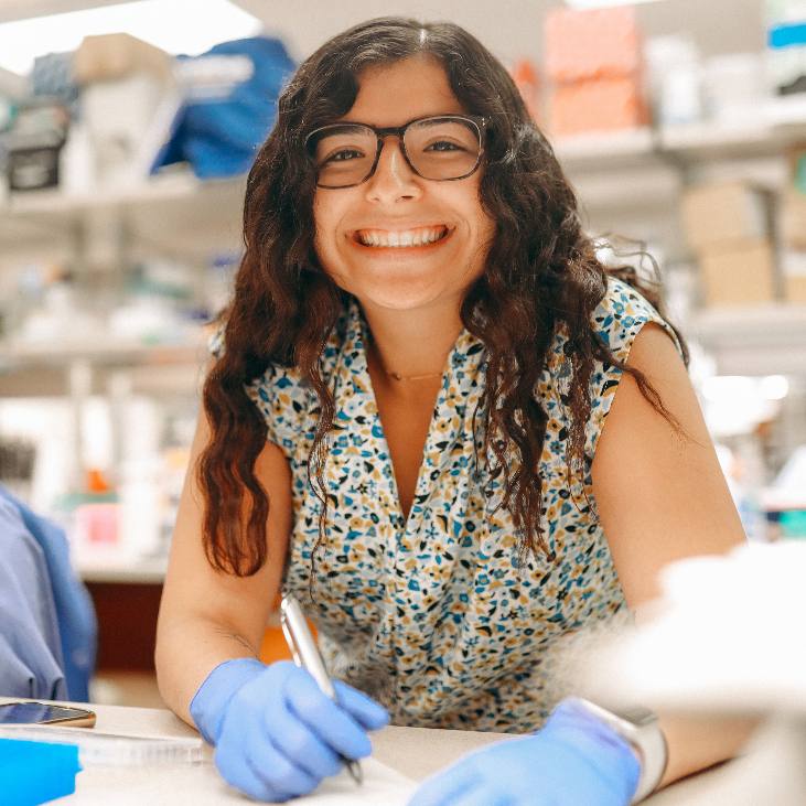 Marissa Russo, Ph.D. wearing gloves