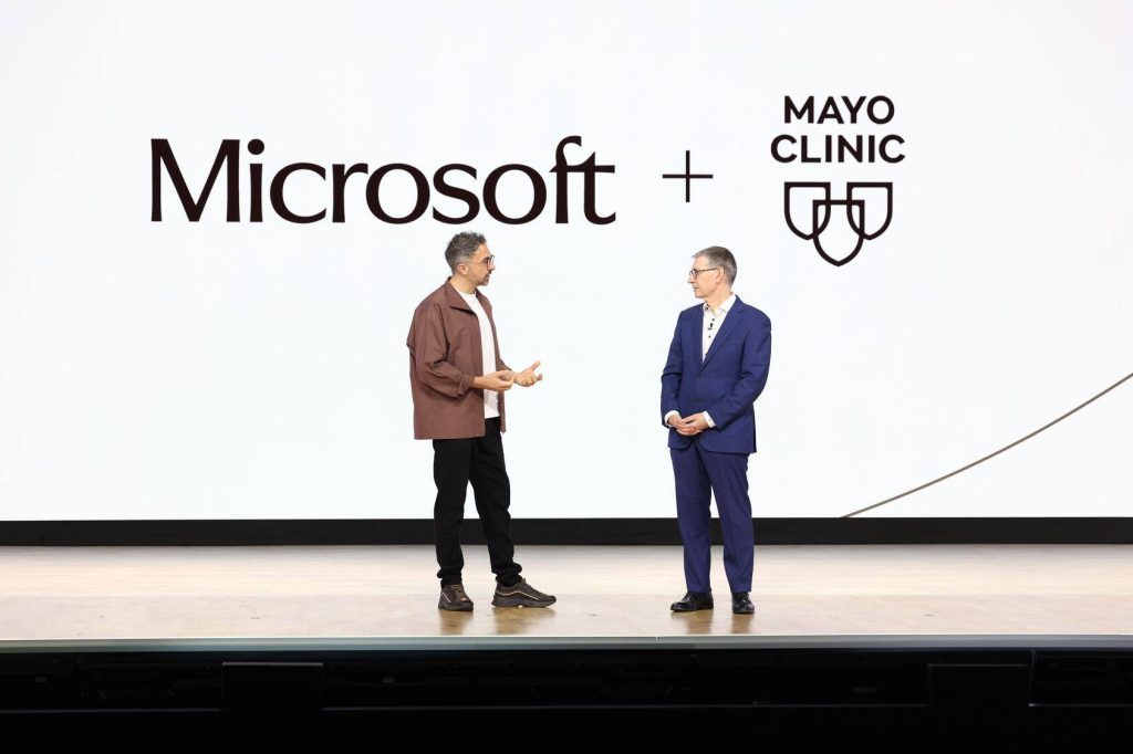 Mustafa Suleyman, CEO of Microsoft AI, and Gianrico Farrugia, M.D., president and CEO, Mayo Clinic