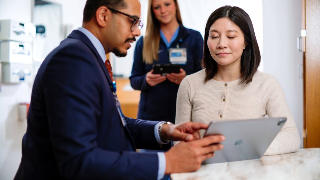 Physician reviewing information with patient